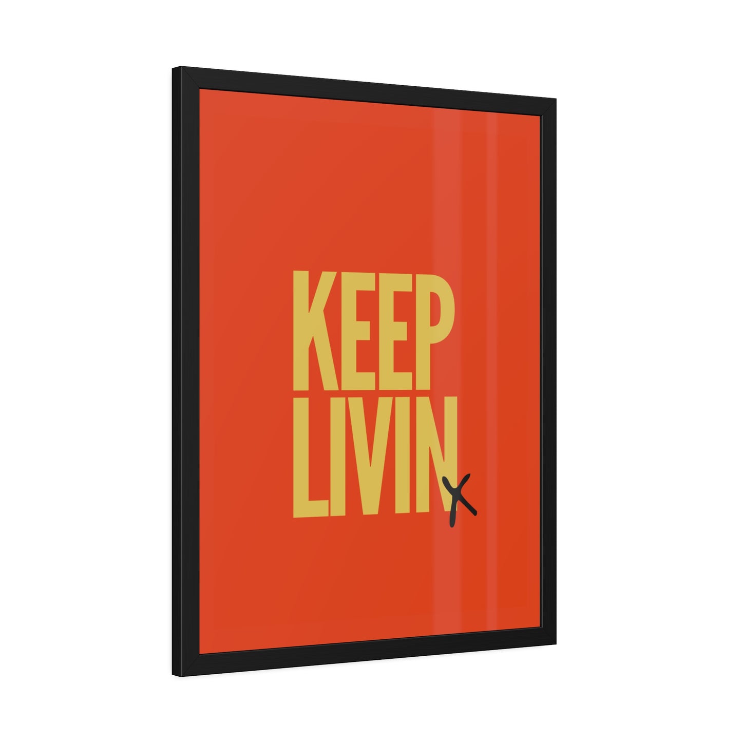 Framed poster with 'KEEP LIVIN' text on a red background